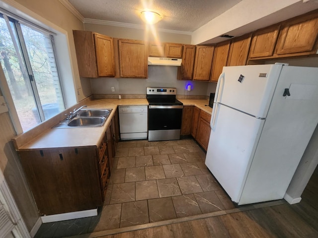 906 Edwards St, Madisonville, KY 42431 - kitchen with a textured ceiling, light countertops, white appliances, under cabinet range hood, and a sink