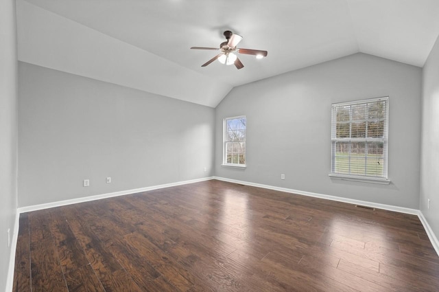 2033 Hidden Cove Rd, Mount Juliet, TN 37122 - unfurnished room featuring lofted ceiling, baseboards, visible vents, ceiling fan, and dark wood-type flooring