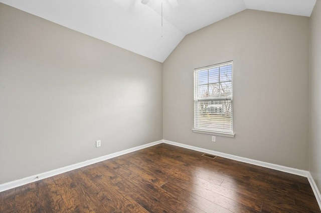 2033 Hidden Cove Rd, Mount Juliet, TN 37122 - spare room featuring lofted ceiling, dark wood-style flooring, baseboards, visible vents, and a ceiling fan