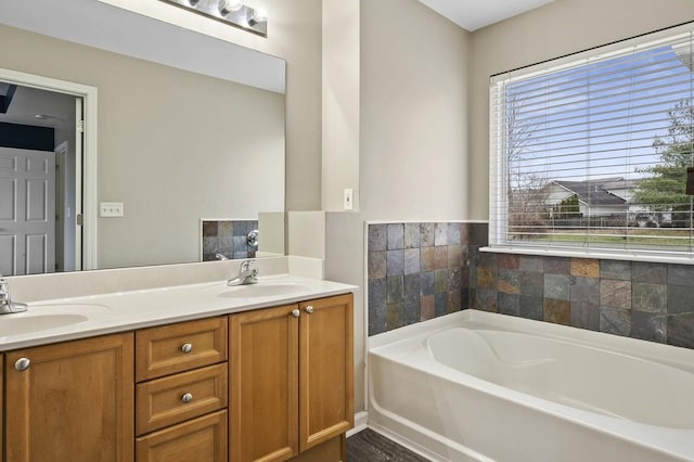 2033 Hidden Cove Rd, Mount Juliet, TN 37122 - bathroom featuring double vanity, a sink, and a bath
