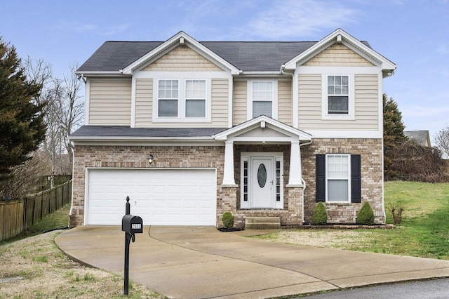 2033 Hidden Cove Rd, Mount Juliet, TN 37122 - view of front of property with brick siding, concrete driveway, fence, and an attached garage