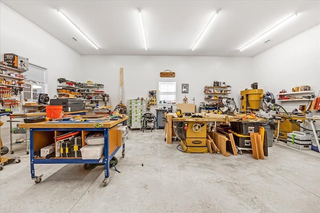 garage with a workshop area
