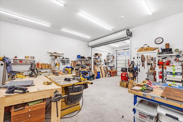 garage featuring a workshop area