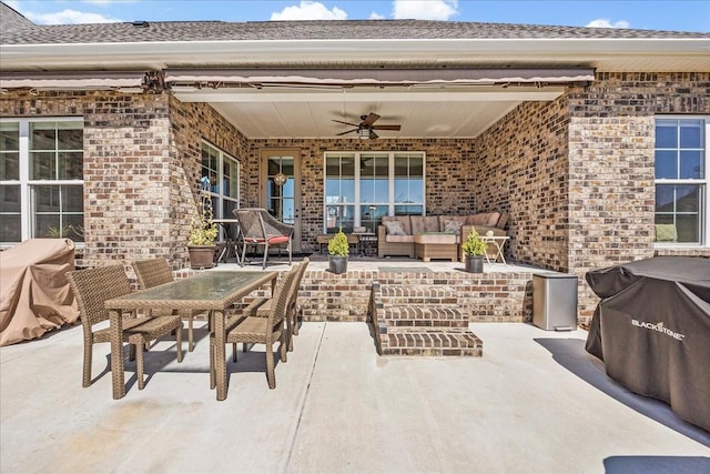view of patio / terrace featuring outdoor dining space, a ceiling fan, an outdoor living space, and a grill
