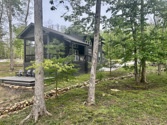 24 Acorn Cv, Tracy City, TN 37387 - view of side of property with a wooden deck and a sunroom