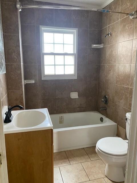 full bath featuring toilet, vanity, shower / bathing tub combination, and tile patterned flooring