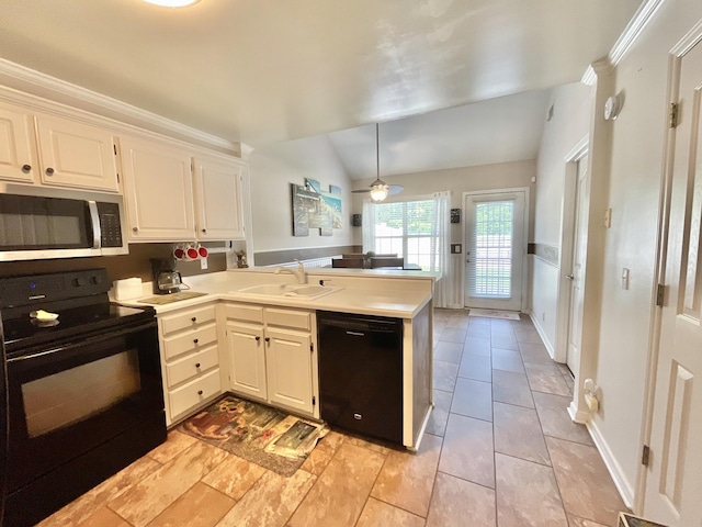 kitchen featuring white cabinets, a sink, light countertops, a peninsula, and black appliances