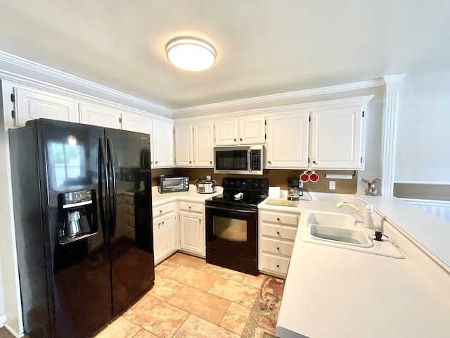 kitchen featuring white cabinets, a sink, light countertops, ornamental molding, and black appliances