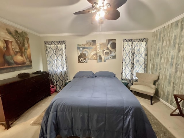 carpeted bedroom featuring crown molding and ceiling fan
