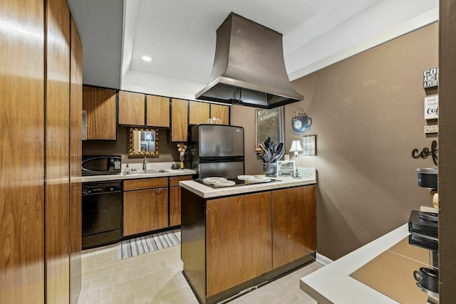 5025 Hillsboro Pike Unit 20E, Nashville, TN 37215 - kitchen with island exhaust hood, a sink, a peninsula, black appliances, and brown cabinets