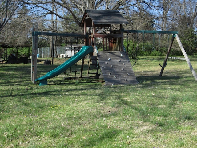 view of playground with a yard