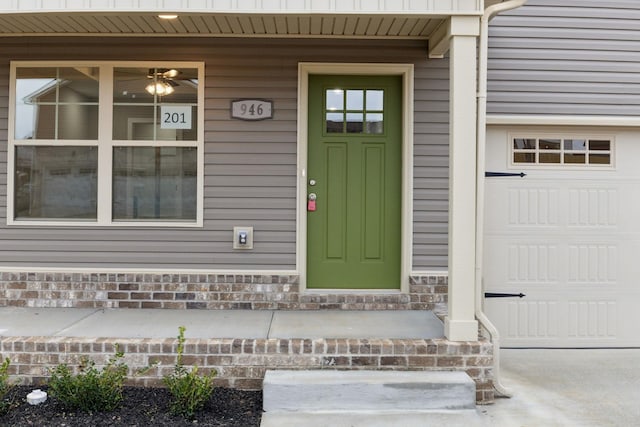 946 Tufnel Dr, Clarksville, TN 37040 - view of exterior entry featuring stone siding and a garage