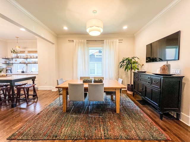 336 Chesterfield Ave, Nashville, TN 37212 - dining room featuring crown molding, baseboards, and wood finished floors