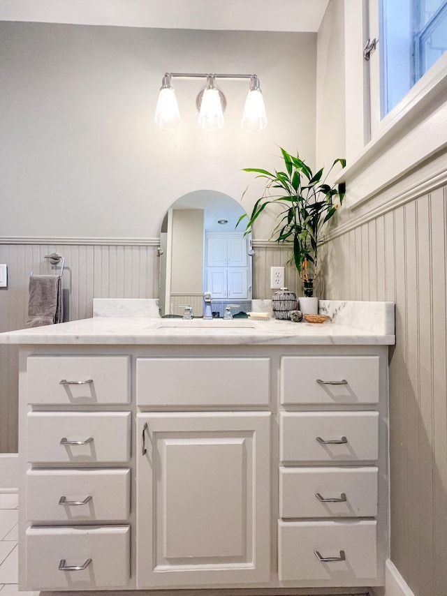 336 Chesterfield Ave, Nashville, TN 37212 - bathroom featuring vanity and wainscoting