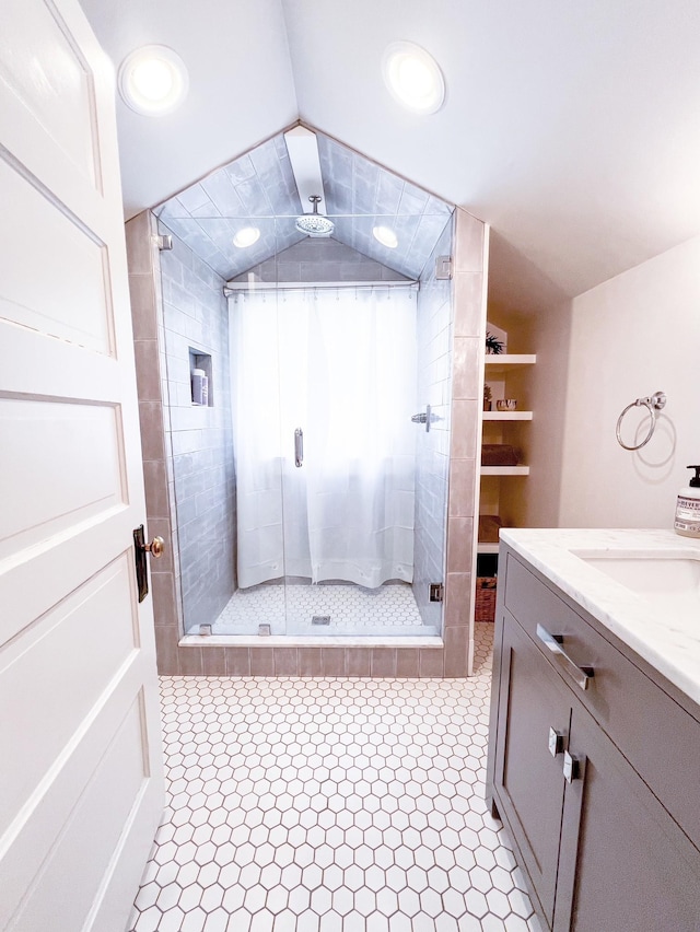 336 Chesterfield Ave, Nashville, TN 37212 - bathroom featuring a shower stall, vaulted ceiling, and vanity