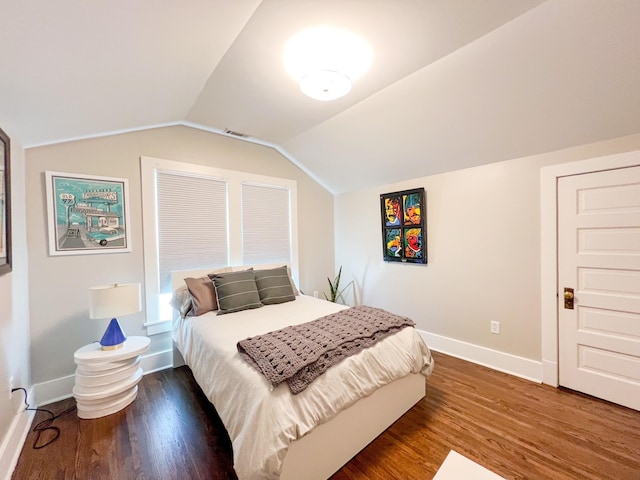 336 Chesterfield Ave, Nashville, TN 37212 - bedroom featuring visible vents, baseboards, lofted ceiling, and wood finished floors