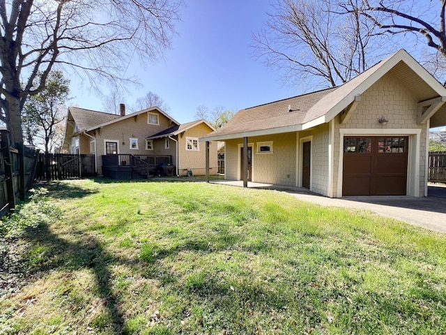 336 Chesterfield Ave, Nashville, TN 37212 - view of front of property with a front yard, a garage, and fence
