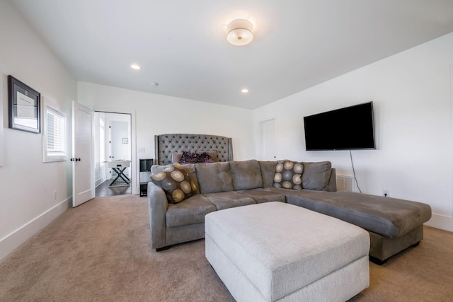 living room featuring baseboards, carpet floors, and recessed lighting