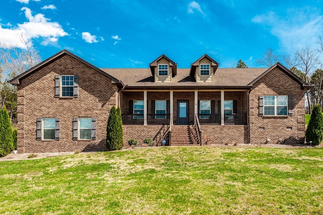 525 Bridle Path Ln, Hartsville, TN 37074 - view of front of property with a porch, a front lawn, and brick siding