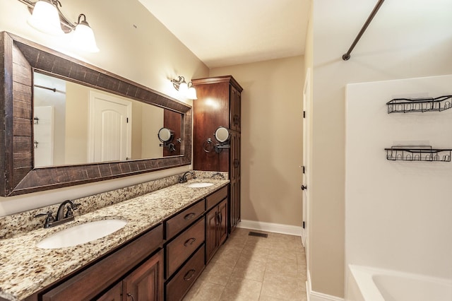 525 Bridle Path Ln, Hartsville, TN 37074 - bathroom with a sink, tile patterned floors, baseboards, and visible vents