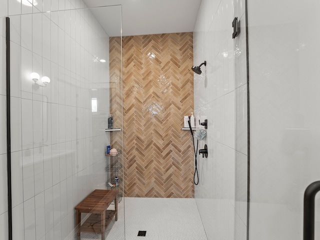 bathroom with a shower stall