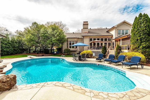 pool featuring a patio area
