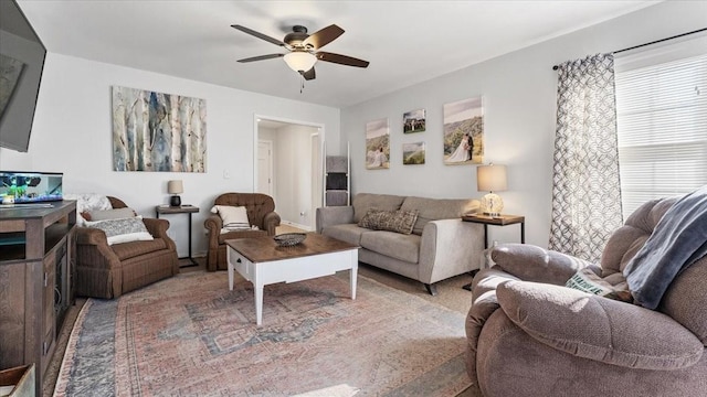 living room featuring ceiling fan