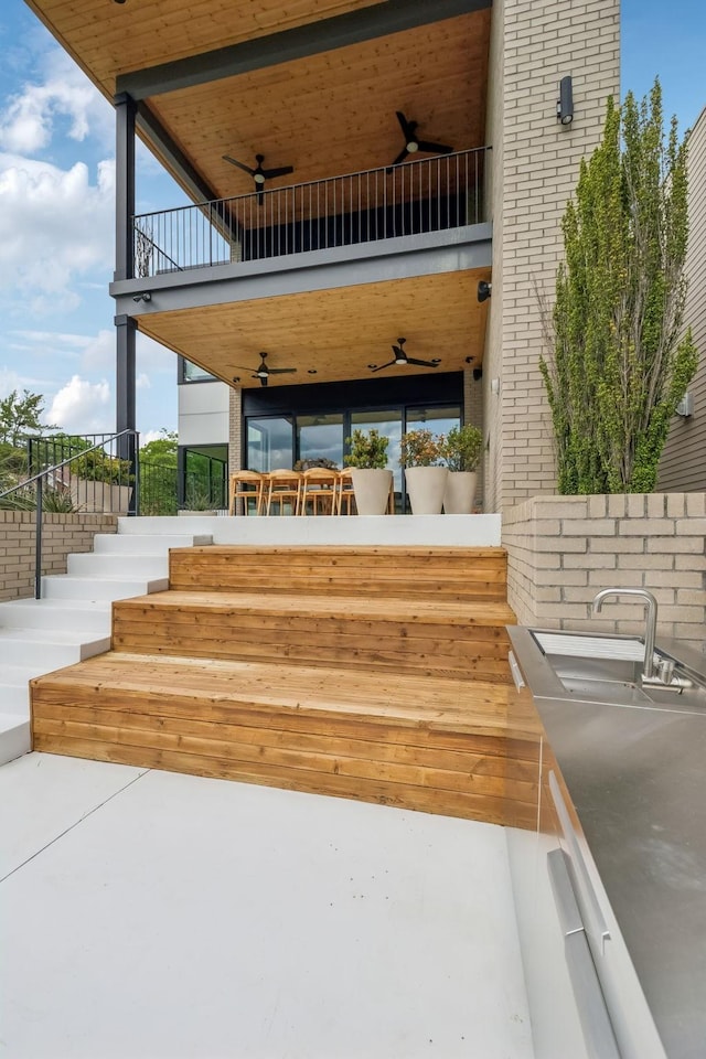 937 Glendale Ln, Nashville, TN 37204 - view of patio with stairs, ceiling fan, and a balcony