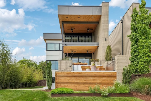 937 Glendale Ln, Nashville, TN 37204 - back of house featuring stucco siding and a balcony