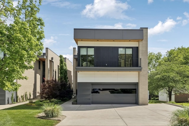 937 Glendale Ln, Nashville, TN 37204 - contemporary house with a garage, driveway, and brick siding