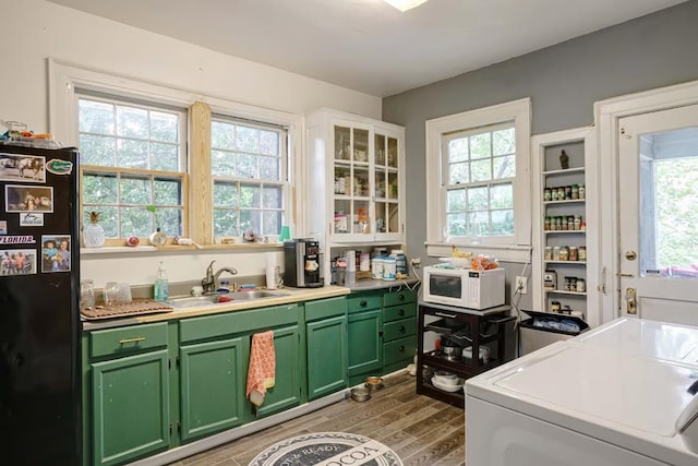 3524 W End Ave, Nashville, TN 37205 - kitchen featuring green cabinets, a sink, freestanding refrigerator, white microwave, and wood tiled floor