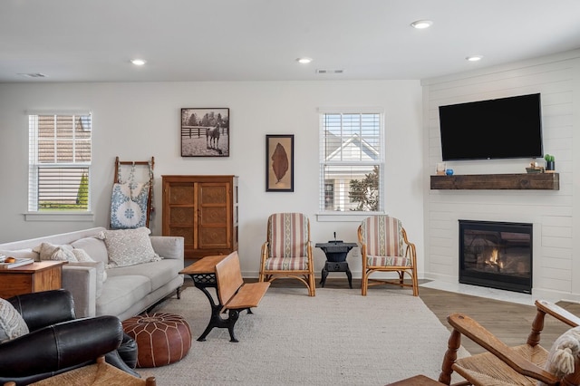 576 Nottingham Ave, Hendersonville, TN 37075 - living room featuring a wealth of natural light, recessed lighting, wood finished floors, and a large fireplace