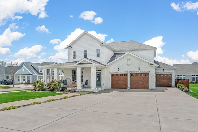 576 Nottingham Ave, Hendersonville, TN 37075 - view of front of home with roof with shingles, covered porch, an attached garage, and concrete driveway