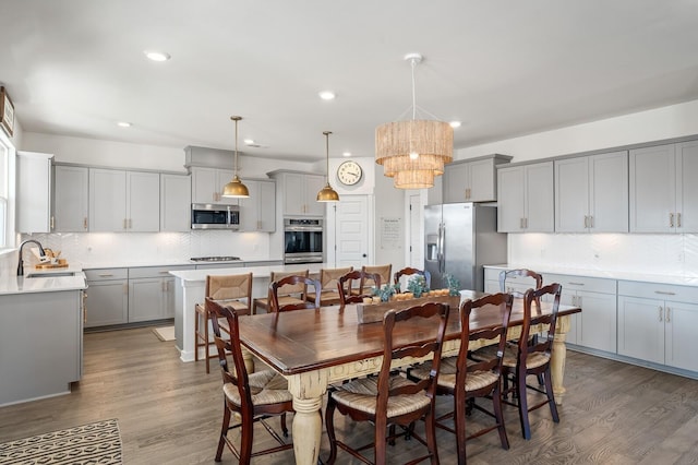 576 Nottingham Ave, Hendersonville, TN 37075 - dining area featuring a notable chandelier, wood finished floors, and recessed lighting