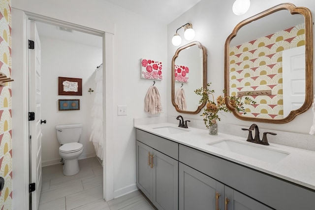576 Nottingham Ave, Hendersonville, TN 37075 - full bathroom featuring visible vents, a sink, toilet, and double vanity