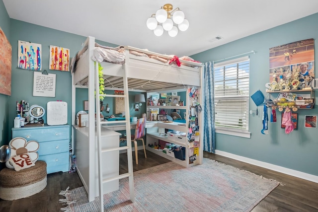 576 Nottingham Ave, Hendersonville, TN 37075 - bedroom with baseboards, visible vents, wood finished floors, and an inviting chandelier