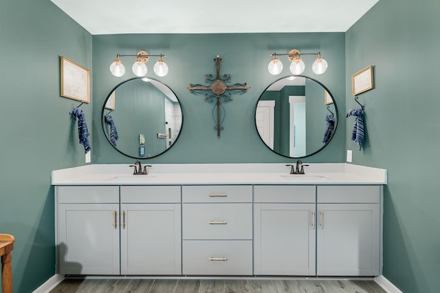 576 Nottingham Ave, Hendersonville, TN 37075 - bathroom featuring double vanity, a sink, and wood finished floors