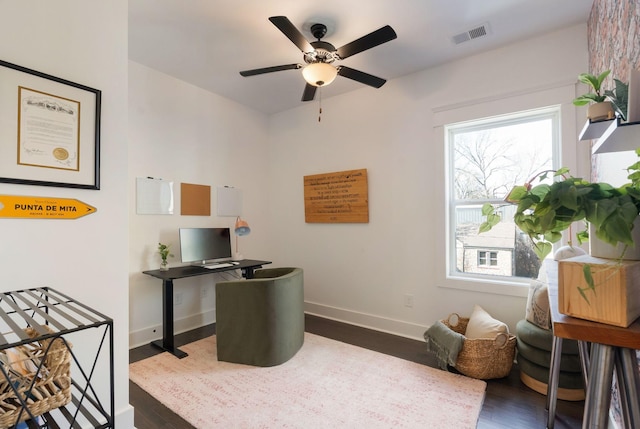 office with wood finished floors, a ceiling fan, and baseboards