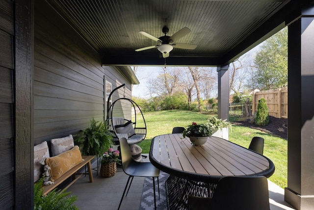 view of patio with a ceiling fan and outdoor dining space