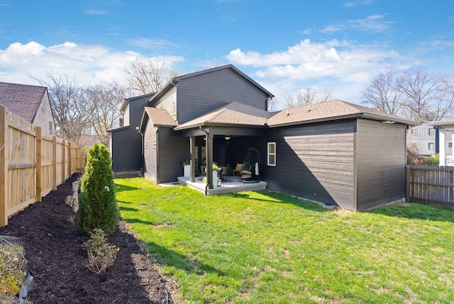 back of property featuring a patio