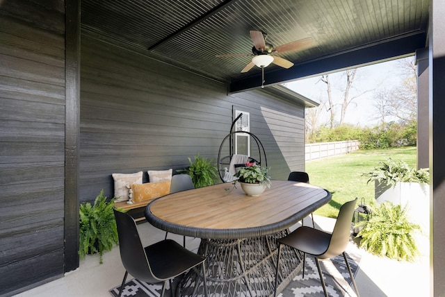 view of patio with ceiling fan and outdoor dining space
