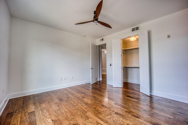 3000 Poston Ave Unit 102, Nashville, TN 37203 - unfurnished bedroom with baseboards, ceiling fan, visible vents, a closet, and wood finished floors