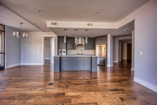 3000 Poston Ave Unit 102, Nashville, TN 37203 - kitchen with light countertops, visible vents, wall chimney exhaust hood, tasteful backsplash, and high end refrigerator