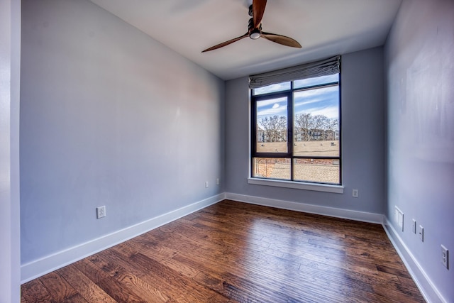 3000 Poston Ave Unit 102, Nashville, TN 37203 - spare room with dark wood-style floors, baseboards, and ceiling fan