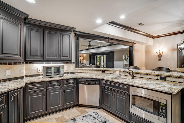 947 Tyne Blvd, Nashville, TN 37220 - kitchen with ornamental molding, a sink, stainless steel appliances, and open floor plan