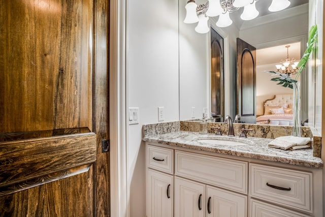 947 Tyne Blvd, Nashville, TN 37220 - bathroom with vanity, a notable chandelier, and ensuite bathroom