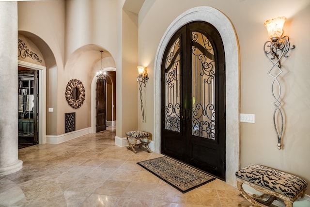 947 Tyne Blvd, Nashville, TN 37220 - entrance foyer with arched walkways, baseboards, and french doors