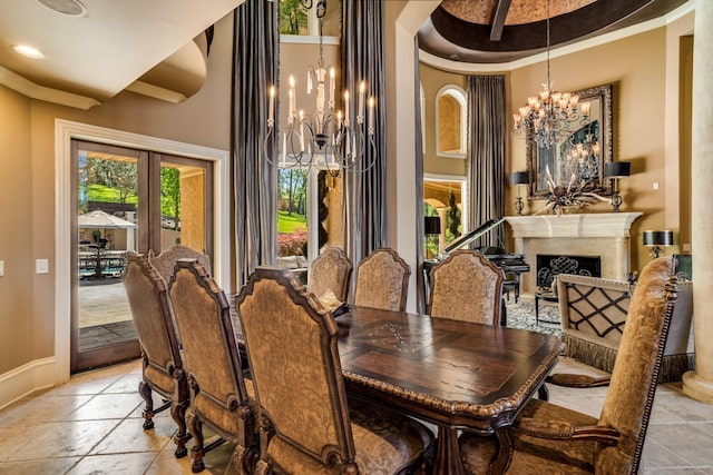 947 Tyne Blvd, Nashville, TN 37220 - dining room featuring an inviting chandelier, a premium fireplace, baseboards, and a high ceiling