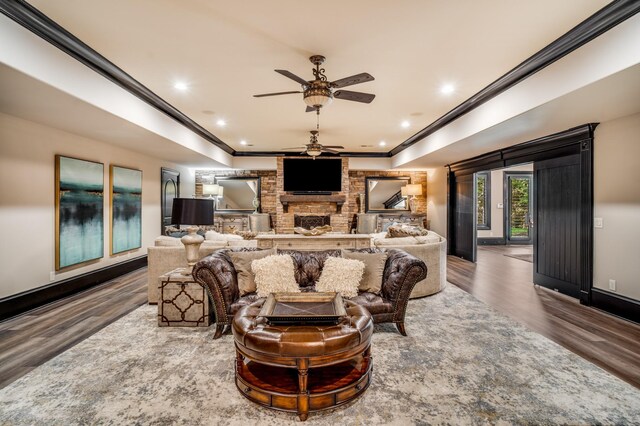 947 Tyne Blvd, Nashville, TN 37220 - living room with crown molding, a fireplace, ceiling fan, wood finished floors, and recessed lighting