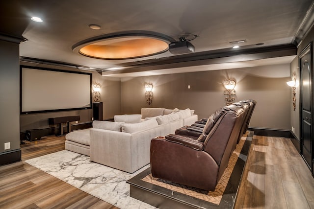 947 Tyne Blvd, Nashville, TN 37220 - cinema featuring a tray ceiling, crown molding, and wood finished floors
